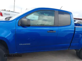 2018 Chevrolet Colorado 2WD Work Truck z VIN 1GCHSBEA8J1300911, wystawiony jako IAAI lot #42543557 z przebiegiem 73 896 mil mil oraz . Historia ofert i sprzedaży dostępna na DreamBid. Obrazek 14.