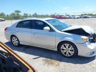 2012 Toyota Avalon with VIN 4T1BK3DB7CU446235, listed as a IAAI auction lot 41957507 with 111,094 mi miles. Bid and sale history available at carsss.com. Image 13.