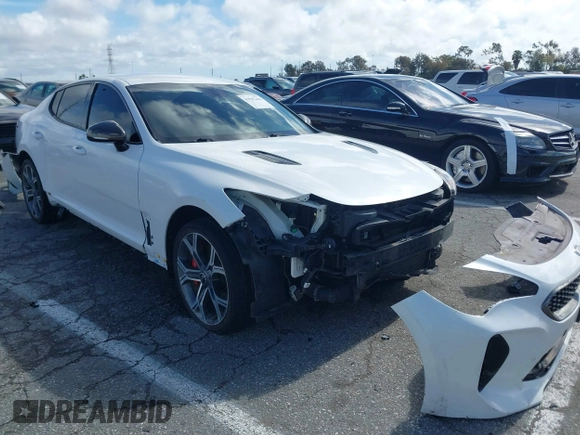 2020 Kia Stinger GT with VIN KNAE35LC1L6083081, listed as a IAAI auction lot 41587406 with 127,877 mi miles. Bid and sale history available at carsss.com. Image 1.