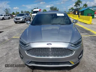 2020 Ford Fusion Titanium with VIN 3FA6P0D95LR199443, listed as a IAAI auction lot 42721371 with 77,592 mi miles and . Bid and sale history available at DreamBid. Image 17.