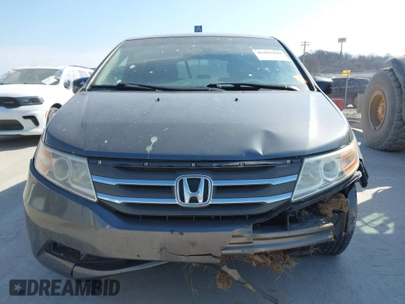 2012 Honda Odyssey EX-L with VIN 5FNRL5H69CB128585, listed as a IAAI auction lot 41695109 with 231,565 mi miles and . Bid and sale history available at carsss.com. Image 6.