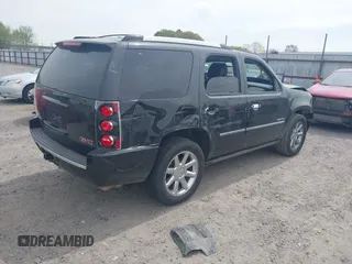 2014 GMC Yukon Denali z VIN 1GKS1EEFXER113493, wystawiony jako IAAI lot #41742662 z przebiegiem 150 382 mil mil oraz . Historia ofert i sprzedaży dostępna na DreamBid. Obrazek 4.