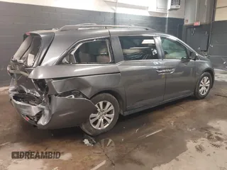 2016 Honda Odyssey EX-L with VIN 5FNRL5H61GB138100, listed as a IAAI auction lot 41548666 with 127,780 mi miles. Bid and sale history available at carsss.com. Image 4.