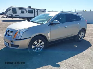 2015 Cadillac SRX Luxury Collection z VIN 3GYFNBE38FS641807, wystawiony jako IAAI lot #41669512 z przebiegiem 147 889 mil mil oraz . Historia ofert i sprzedaży dostępna na DreamBid. Obrazek 2.
