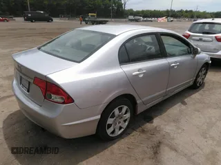 2009 Honda Civic LX z VIN 19XFA165X9E045127, wystawiony jako IAAI lot #42263412 z przebiegiem 208 762 mil mil oraz . Historia ofert i sprzedaży dostępna na DreamBid. Obrazek 4.