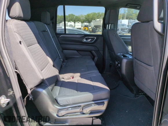 2023 Chevrolet Suburban LS with VIN 1GNSCBKD1PR132161, listed as a Copart auction lot 70649614 with 24,850 mi miles and Salvage Title. Bid and sale history available at DreamBid. Image 11.