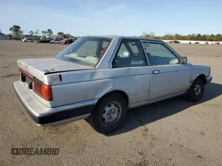 1990 Nissan Sentra z VIN 1N4GB22B7LC773110, wystawiony jako Copart lot #55384855 z przebiegiem 48 159 mil mil oraz Tytuł czysty. Historia ofert i sprzedaży dostępna na DreamBid. Obrazek 3.