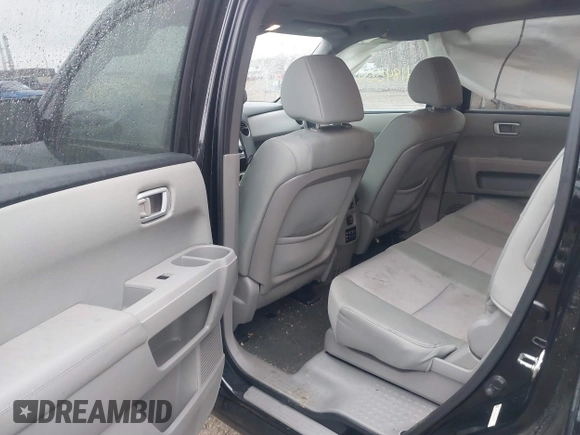 2015 Honda Pilot SE with VIN 5FNYF4H36FB062844, listed as a IAAI auction lot 41845542 with 165,368 mi miles and . Bid and sale history available at DreamBid. Image 8.