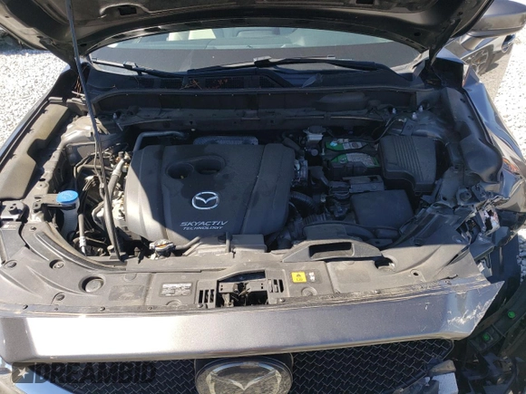 2018 Mazda CX-5 Grand Touring with VIN JM3KFADM2J1313418, listed as a Copart auction lot 49486875 with 94,930 mi miles and Salvage Title. Bid and sale history available at carsss.com. Image 12.