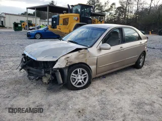 2004 Kia Spectra LX with VIN KNAFE121645010898, listed as a Copart auction lot 74378304 with 0 mi miles and Salvage Title. Bid and sale history available at carsss.com. Image 1.