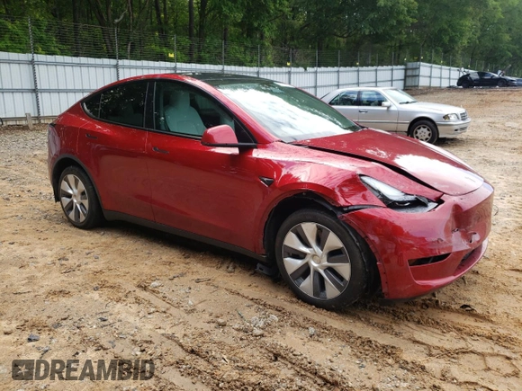 2024 Tesla Model Y Long Range with VIN 7SAYGDEE2RA269884, listed as a Copart auction lot 56937585 with 49,374 mi miles and Salvage title. Bid and sale history available at DreamBid. Image 4.