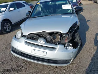 2010 Hyundai Accent GS with VIN KMHCM3AC2AU164786, listed as a IAAI auction lot 41995191 with 148,174 mi miles. Bid and sale history available at carsss.com. Image 6.
