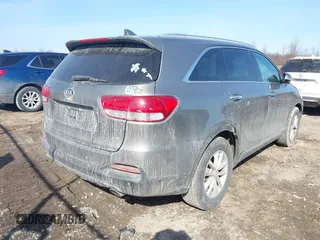 2016 Kia Sorento LX with VIN 5XYPGDA54GG065563, listed as a IAAI auction lot 41801533 with 126,557 mi miles. Bid and sale history available at carsss.com. Image 4.