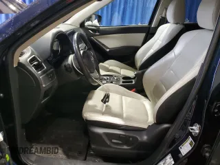 2016 Mazda CX-5 Grand Touring with VIN JM3KE4DY9G0708024, listed as a Copart auction lot 44689995 with 113,002 mi miles and Salvage Title. Bid and sale history available at DreamBid. Image 7.