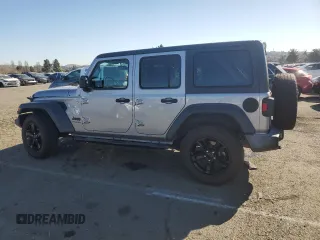 2019 Jeep Wrangler Unlimited Sport with VIN 1C4HJXDG8KW632213, listed as a Copart auction lot 42623815 with 121,014 mi miles and Salvage title. Bid and sale history available at DreamBid. Image 2.