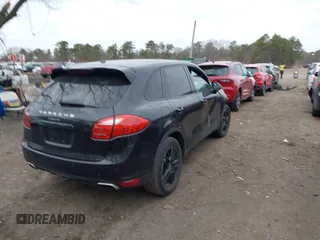2014 Porsche Cayenne with VIN WP1AA2A22ELA95730, listed as a IAAI auction lot 41775948 with 165,343 mi miles and . Bid and sale history available at DreamBid. Image 4.