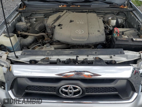 2013 Toyota Tacoma z VIN 5TFMU4FN5DX010469, wystawiony jako Copart lot #55607015 z przebiegiem 140 849 mil mil oraz Szkoda całkowita • Salvage title. Historia ofert i sprzedaży dostępna na DreamBid. Obrazek 11.