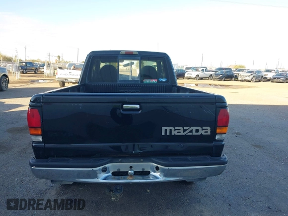1999 Mazda B-Series 2WD Truck SE with VIN 4F4YR16V8XTM09770, listed as a IAAI auction lot 41416620 with 245,604 mi miles. Bid and sale history available at carsss.com. Image 17.
