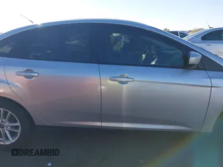2018 Ford Focus SE z VIN 1FADP3F27JL204873, wystawiony jako IAAI lot #41657504 z przebiegiem 99 224 mil mil oraz . Historia ofert i sprzedaży dostępna na DreamBid. Obrazek 13.