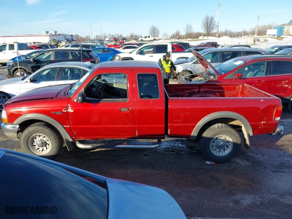 1999 Ford Ranger XLT with VIN 1FTZR15X1XTA90177, listed as a IAAI auction lot 41328368 with 360,832 mi miles. Bid and sale history available at carsss.com. Image 14.
