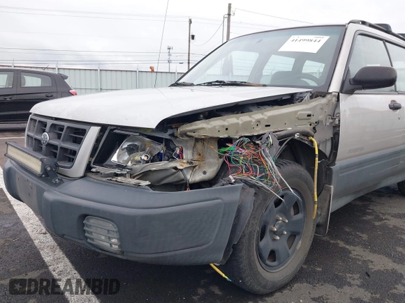 2000 Subaru Forester L with VIN JF1SF6353YH701667, listed as a IAAI auction lot 41499844 with 203,050 mi miles. Bid and sale history available at carsss.com. Image 6.