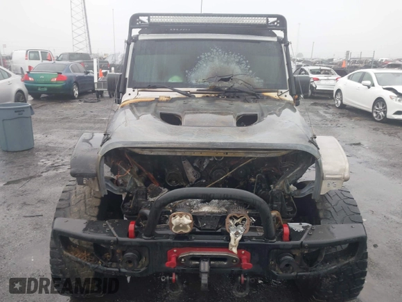 2016 Jeep Wrangler Unlimited Rubicon with VIN 1C4BJWFGXGL185227, listed as a IAAI auction lot 41555159 with 1 mi miles. Bid and sale history available at carsss.com. Image 14.