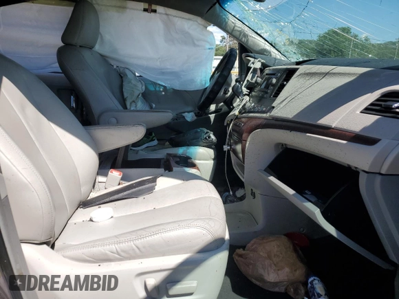 2012 Toyota Sienna XLE AAS with VIN 5TDYK3DC4CS197176, listed as a Copart auction lot 57942845 with Not provided miles and Salvage title. Bid and sale history available at DreamBid. Image 7.