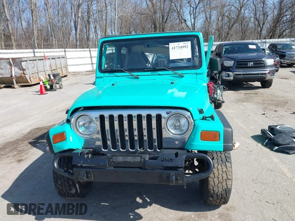 1997 Jeep Wrangler Sport with VIN 1J4FY19S2VP423426, listed as a IAAI auction lot 41734992 with 164,706 mi miles. Bid and sale history available at carsss.com. Image 12.