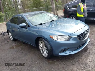 2014 Mazda 6 i Touring with VIN JM1GJ1V65E1147317, listed as a IAAI auction lot 42013078 with 184,973 mi miles and . Bid and sale history available at DreamBid. Image 1.