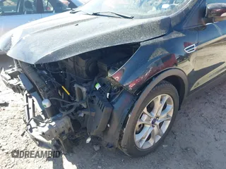 2015 Ford Escape Titanium with VIN 1FMCU0J91FUB36973, listed as a IAAI auction lot 41889560 with 93,445 mi miles and . Bid and sale history available at DreamBid. Image 17.