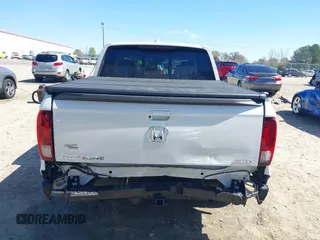 2020 Honda Ridgeline RTL-E with VIN 5FPYK3F75LB000317, listed as a IAAI auction lot 41850029 with 17,430 mi miles and . Bid and sale history available at DreamBid. Image 17.