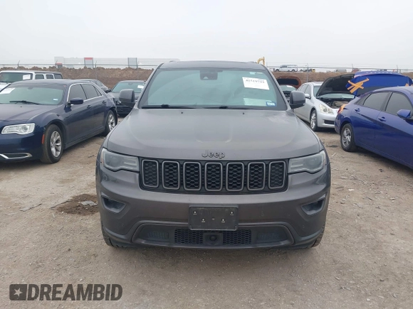 2021 Jeep Grand Cherokee 80th Anniversary z VIN 1C4RJFBGXMC621817, wystawiony jako IAAI lot #41519733 z przebiegiem 60 552 mil mil oraz . Historia ofert i sprzedaży dostępna na DreamBid. Obrazek 12.