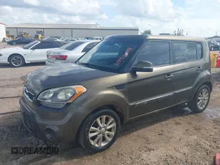 2012 Kia Soul + with VIN KNDJT2A67C7376281, listed as a IAAI auction lot 41955049 with 231,635 mi miles. Bid and sale history available at carsss.com. Image 2.