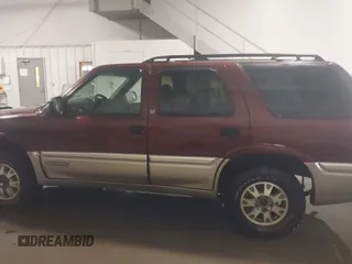 2001 GMC Jimmy SLE with VIN 1GKDT13W712195040, listed as a IAAI auction lot 41710729 with 189,584 mi miles. Bid and sale history available at carsss.com. Image 14.