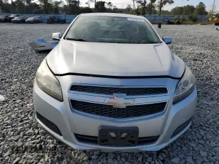 2013 Chevrolet Malibu LT with VIN 1G11C5SA4DF121902, listed as a Copart auction lot 77942074 with 137,686 mi miles and Salvage Title. Bid and sale history available at DreamBid. Image 5.