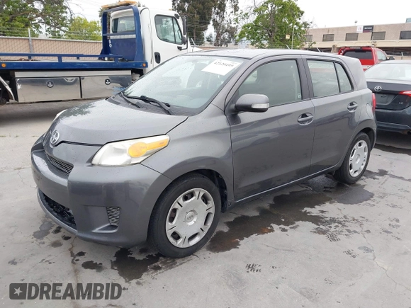 2010 Scion xD with VIN JTKKU4B44A1003993, listed as a IAAI auction lot 42120495 with 71,118 mi miles. Bid and sale history available at carsss.com. Image 2.