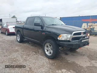 2018 Ram 1500 Tradesman z VIN 1C6RR7KM1JS227300, wystawiony jako IAAI lot #42205971 z przebiegiem 109 104 mil mil oraz . Historia ofert i sprzedaży dostępna na DreamBid. Obrazek 1.