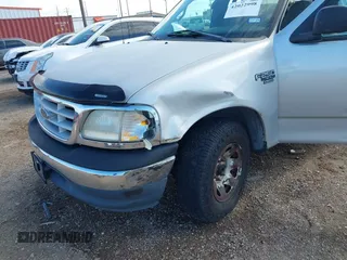 1999 Ford F-250 z VIN 2FTRX27L3XCA14587, wystawiony jako IAAI lot #42022998 z przebiegiem Nie podano mil oraz . Historia ofert i sprzedaży dostępna na DreamBid. Obrazek 6.