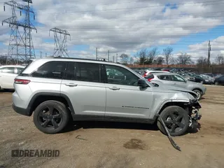 2023 Jeep Grand Cherokee Laredo with VIN 1C4RJHAG2PC660418, listed as a IAAI auction lot 41693879 with 4,295 mi miles and . Bid and sale history available at DreamBid. Image 13.