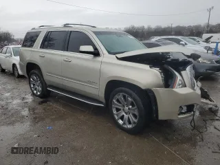 2015 GMC Yukon Denali with VIN 1GKS2CKJ3FR592707, listed as a Copart auction lot 47581575 with 121,326 mi miles and Salvage Title. Bid and sale history available at carsss.com. Image 4.