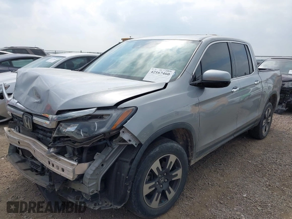 2019 Honda Ridgeline RTL-E with VIN 5FPYK3F73KB006244, listed as a IAAI auction lot 42167460 with 53,498 mi miles and . Bid and sale history available at DreamBid. Image 2.