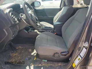 2021 Toyota Tacoma SR with VIN 3TYAX5GN8MT018185, listed as a Copart auction lot 59977895 with 68,149 mi miles and Salvage title. Bid and sale history available at DreamBid. Image 7.