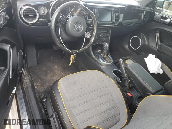 2016 Volkswagen Beetle with VIN 3VWS07AT5GM621801, listed as a Copart auction lot 77085764 with Not Provided miles and Salvage Title. Bid and sale history available at DreamBid. Image 8.