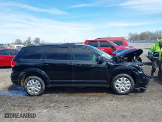 2017 Dodge Journey SE with VIN 3C4PDCAB2HT698940, listed as a IAAI auction lot 41843176 with 141,499 mi miles. Bid and sale history available at carsss.com. Image 13.