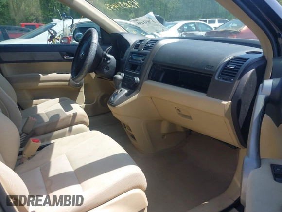 2007 Honda CR-V LX with VIN 5J6RE38377L000654, listed as a IAAI auction lot 42031455 with 112,869 mi miles. Bid and sale history available at carsss.com. Image 5.