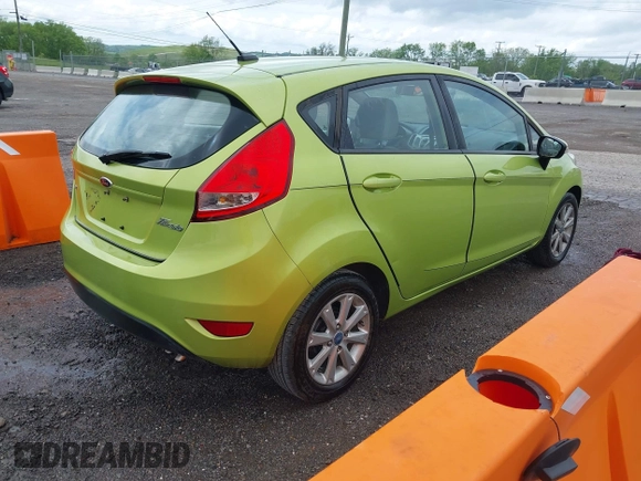 2013 Ford Fiesta SE with VIN 3FADP4EJ7DM136723, listed as a IAAI auction lot 42090284 with 168,004 mi miles and . Bid and sale history available at DreamBid. Image 4.