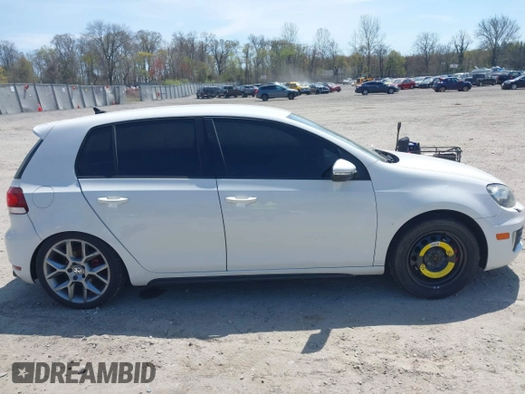 2013 Volkswagen GTI Driver's Edition z VIN WVWHV7AJ2DW135293, wystawiony jako IAAI lot #42054437 z przebiegiem 134 795 mil mil oraz . Historia ofert i sprzedaży dostępna na DreamBid. Obrazek 13.