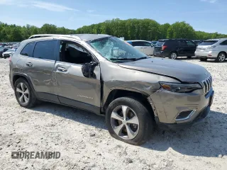 2020 Jeep Cherokee Limited with VIN 1C4PJMDX6LD617135, listed as a Copart auction lot 59088015 with 63,147 mi miles and Salvage title. Bid and sale history available at DreamBid. Image 4.