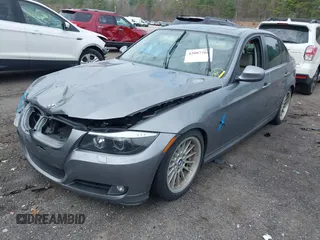 2011 BMW 3 Series 328i xDrive with VIN WBAPK5G59BNN31420, listed as a IAAI auction lot 42087265 with 121,209 mi miles. Bid and sale history available at carsss.com. Image 2.