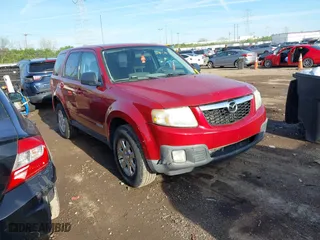 2008 Mazda Tribute Touring with VIN 4F2CZ02Z28KM25492, listed as a IAAI auction lot 42100730 with 231,093 mi miles. Bid and sale history available at carsss.com. Image 1.